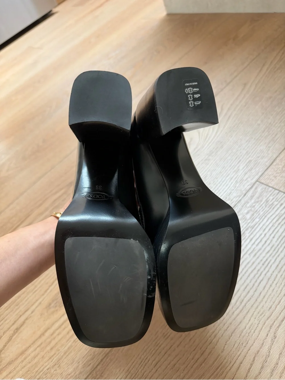 Tod's Black Leather Loafers with Gold Horsebit Detail